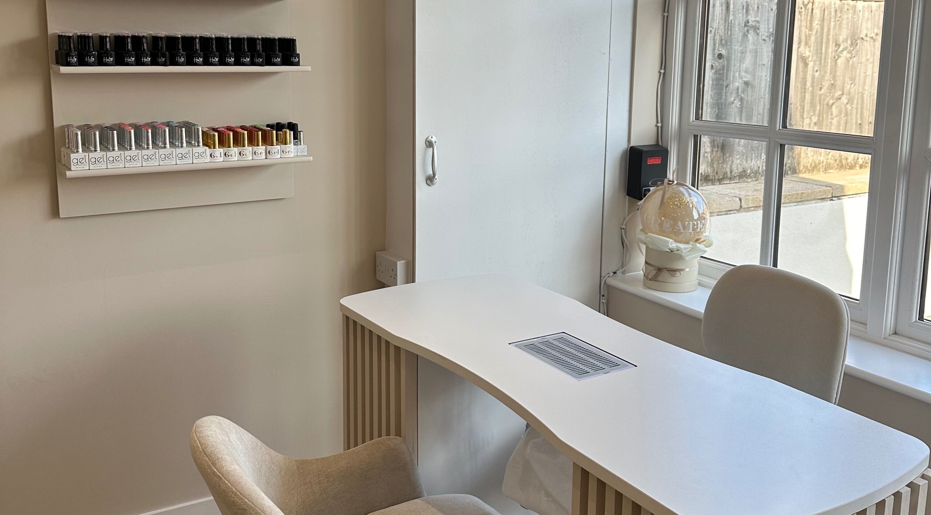 Nail treatment station at Created, showcasing nail polishes in Swinton, England, GB.