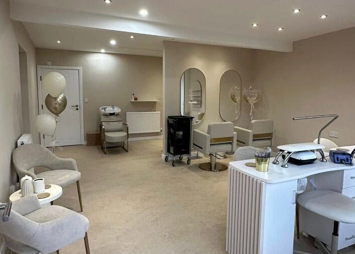 Chic beauty salon interior at Created in Swinton, England, GB with modern decor and styling stations.