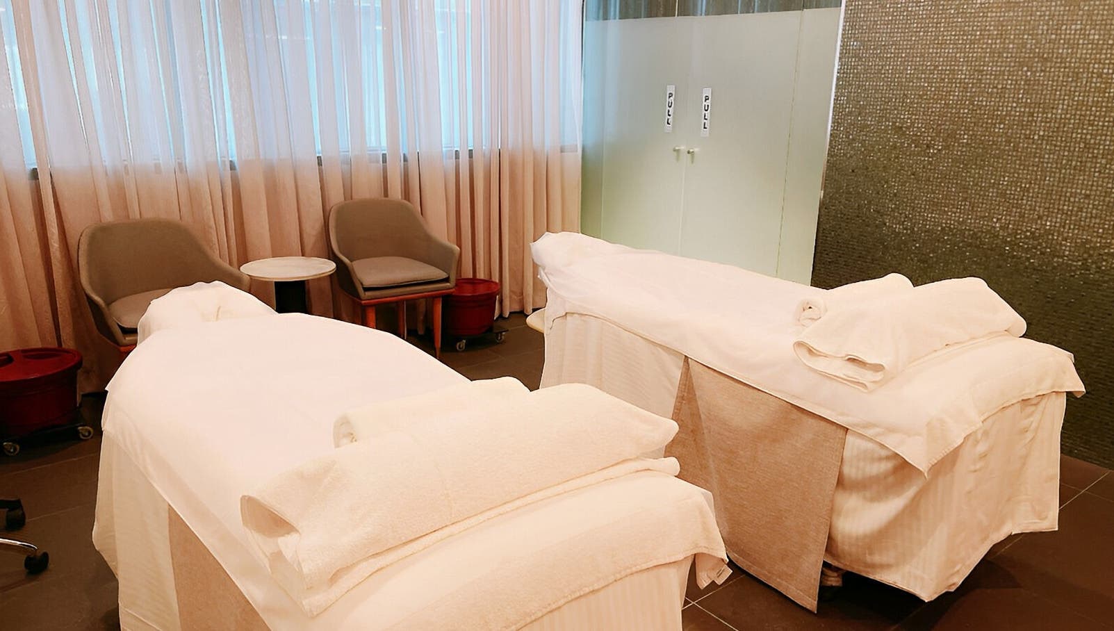 Relaxing massage room at IOMI Spa, Sheraton Hotel, Melbourne, Victoria for ultimate wellness experience.