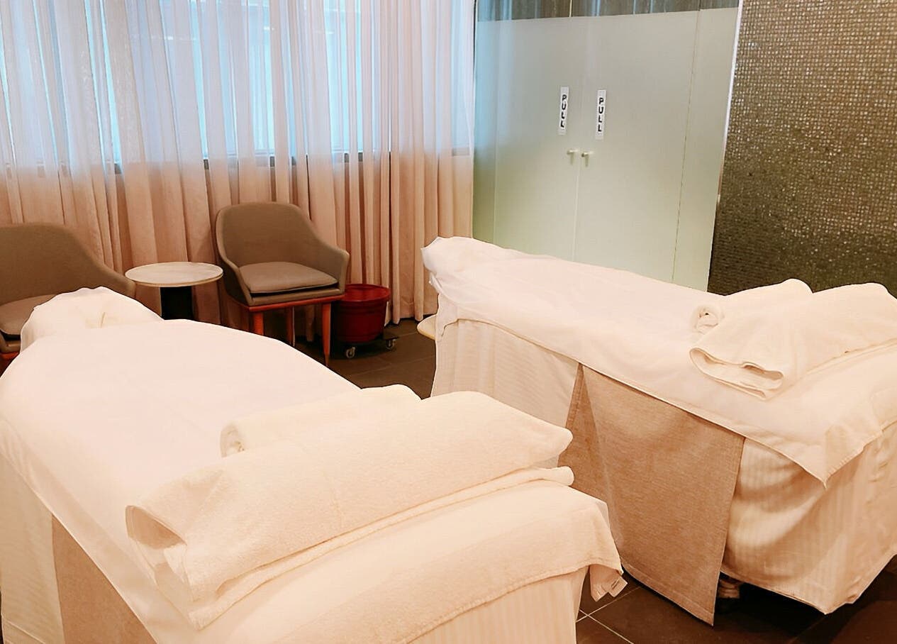 Relaxing massage room at IOMI Spa, Sheraton Hotel, Melbourne, Victoria for ultimate wellness experience.