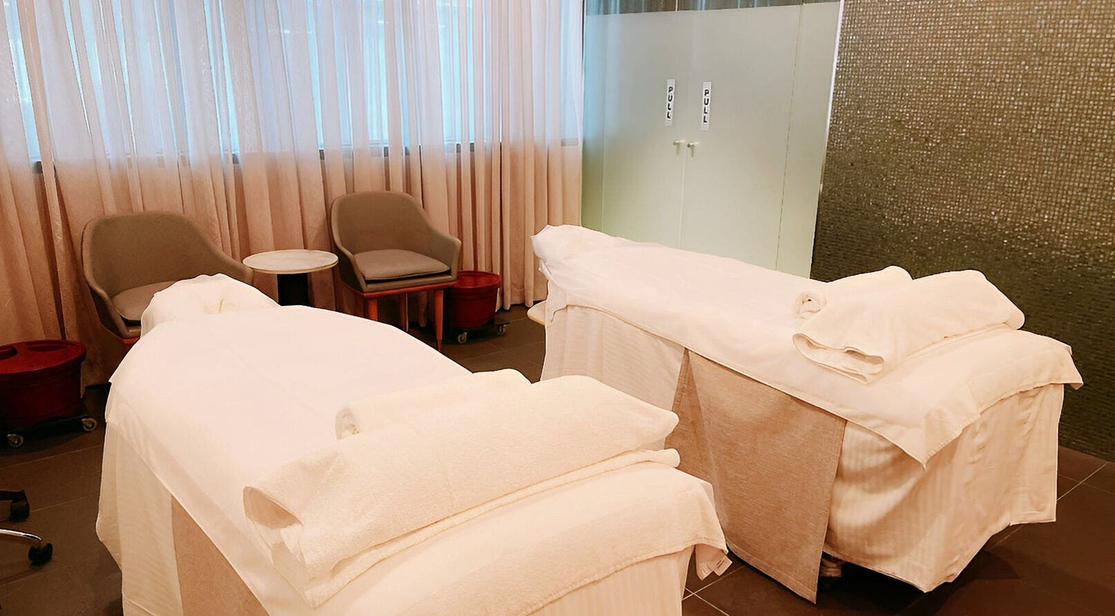 Relaxing massage room at IOMI Spa, Sheraton Hotel, Melbourne, Victoria for ultimate wellness experience.