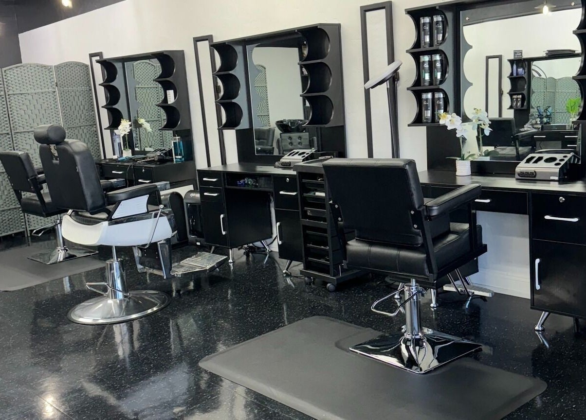 Modern styling chairs and mirrors in Leghecy Beauty Salon, Costa Mesa, California, US.