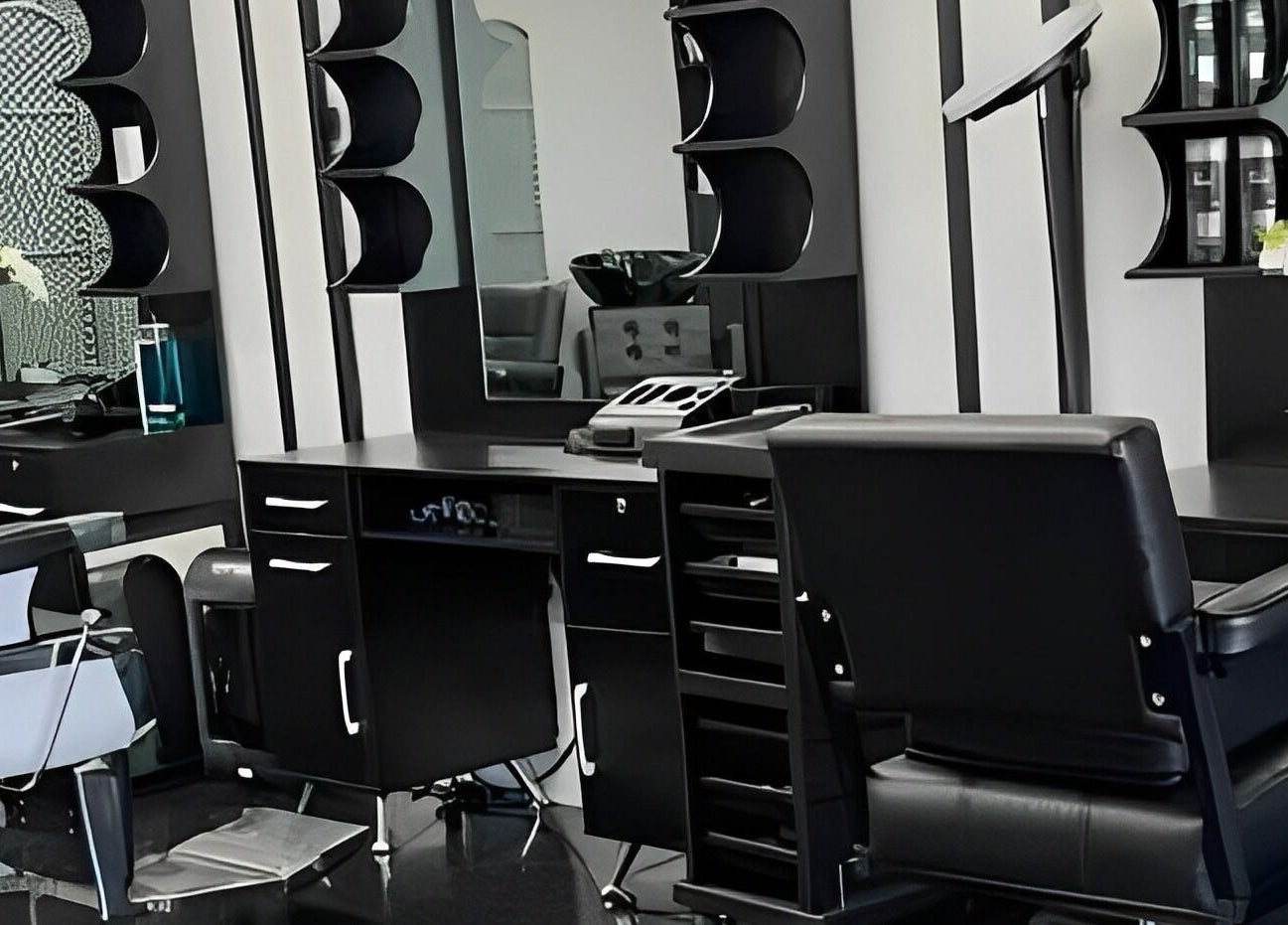 Modern styling station at Leghecy Beauty Salon, Costa Mesa, California, US, showcasing sleek black decor.