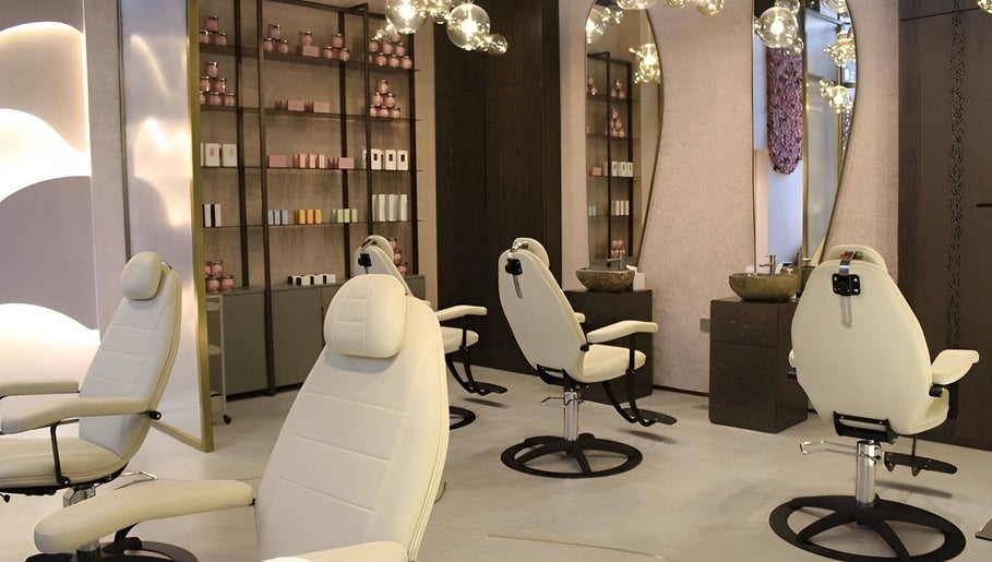 Elegant interior of Skinlyft, showcasing modern treatment chairs in Dubai, Dubai, AE.