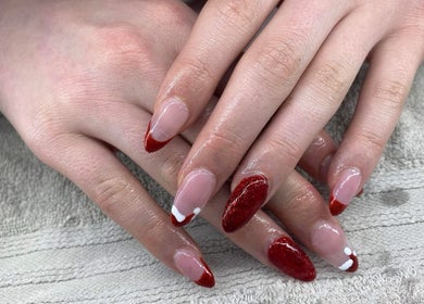 Elegant red-tipped manicure at Diversity Skin & Beauty Studio, Cwmbran, Wales, GB.
