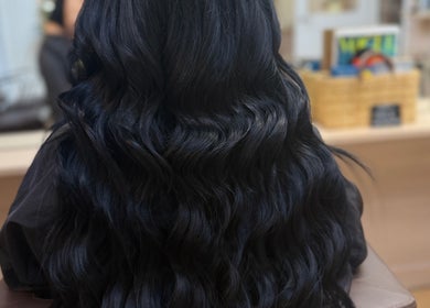Long, silky black hair extensions at Georgia J Extensions, Bicester, England, GB.