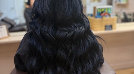 Long, silky black hair extensions at Georgia J Extensions, Bicester, England, GB.
