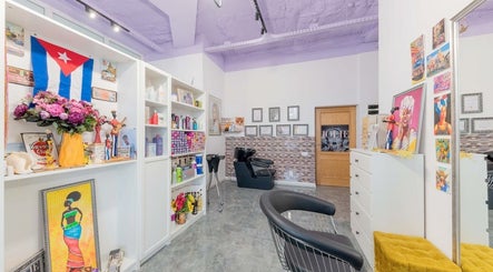 Colorful interior at Salon Jolie by Marie in București, București, RO, showcasing vibrant decor and beauty products.