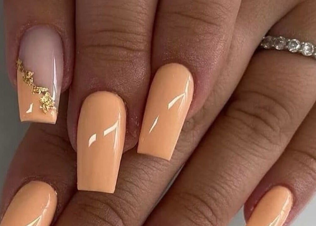 Elegant peach nails with gold detail at Vip Nails By Wafa, Glasgow, Scotland, GB.