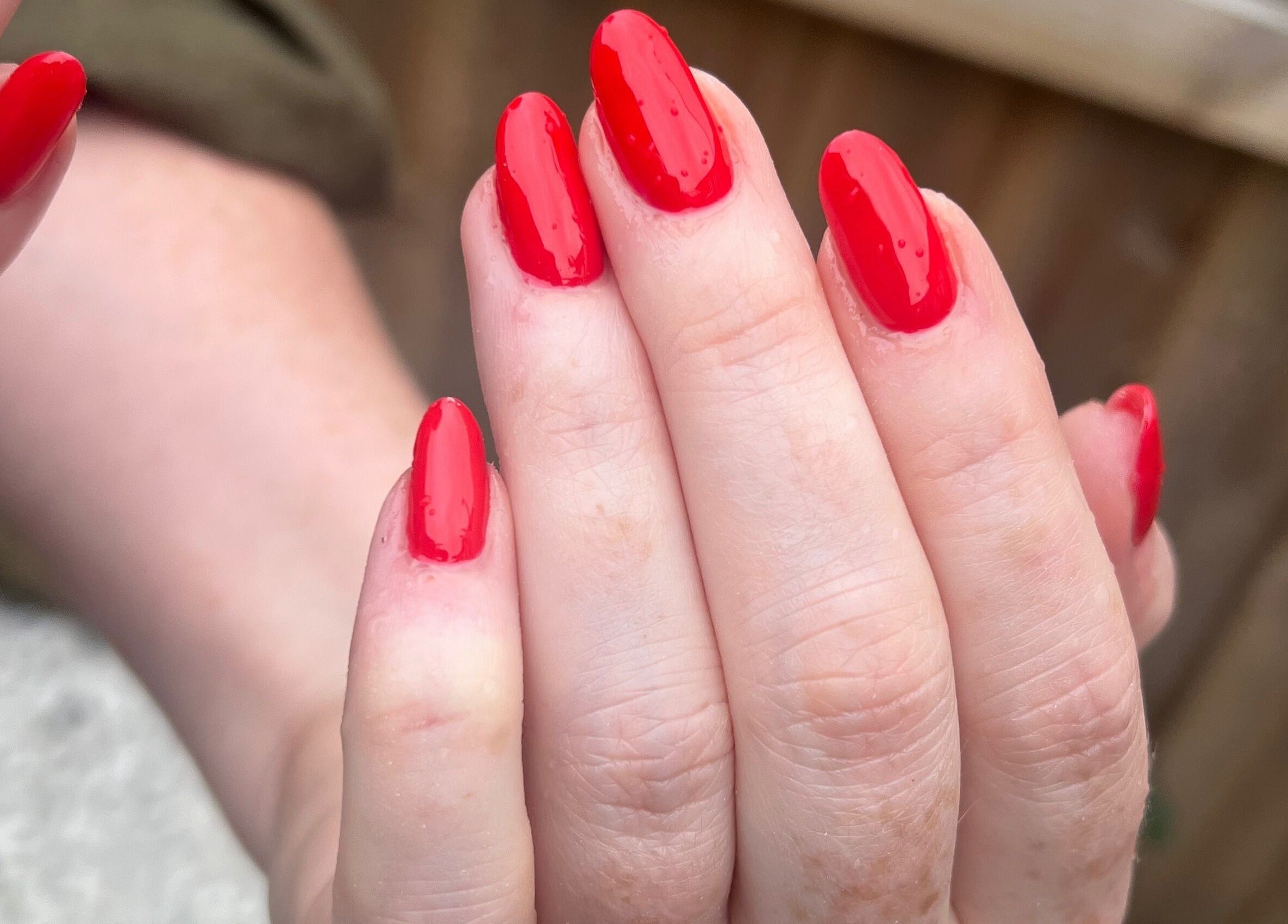 Bright red nail manicure at Vip Nails By Wafa, Glasgow, Scotland, GB. Expert nail care and artistry.