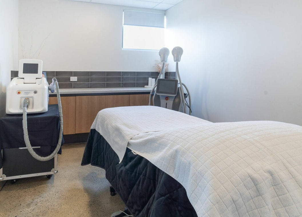 Treatment room at Sophie Austin Skin in Karrinyup, WA, AU, featuring a therapy bed and modern facial equipment.