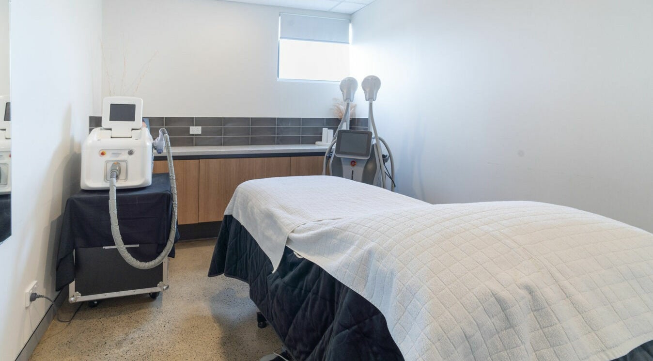 Treatment room at Sophie Austin Skin in Karrinyup, WA, AU, featuring a therapy bed and modern facial equipment.