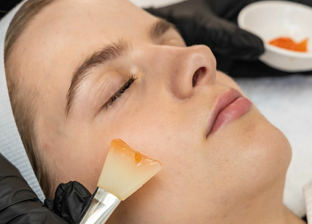 Woman receiving a facial treatment at Sophie Austin Skin, Karrinyup, WA, AU for ultimate relaxation and skincare.