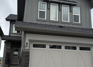 Front view of Le Body Space, a modern building in Cochrane, Alberta, CA with stylish exterior design.