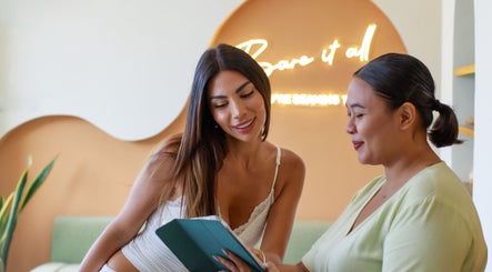 Client consultation at Beam & Bare, Bali, Bali, ID. Relaxed atmosphere with professional service.