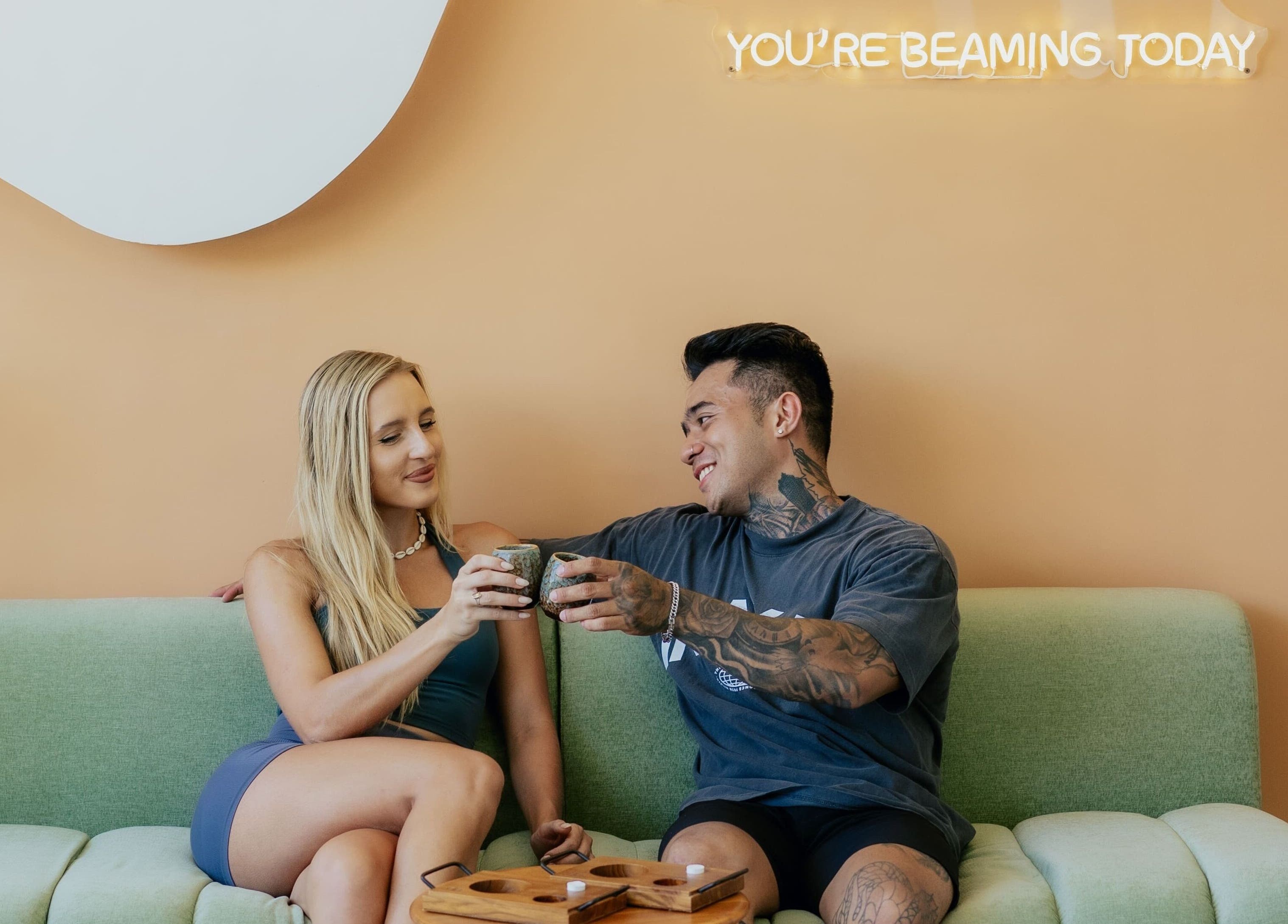 Guests enjoying a relaxing moment at Beam & Bare, Bali, Bali, ID, in a stylish seating area.