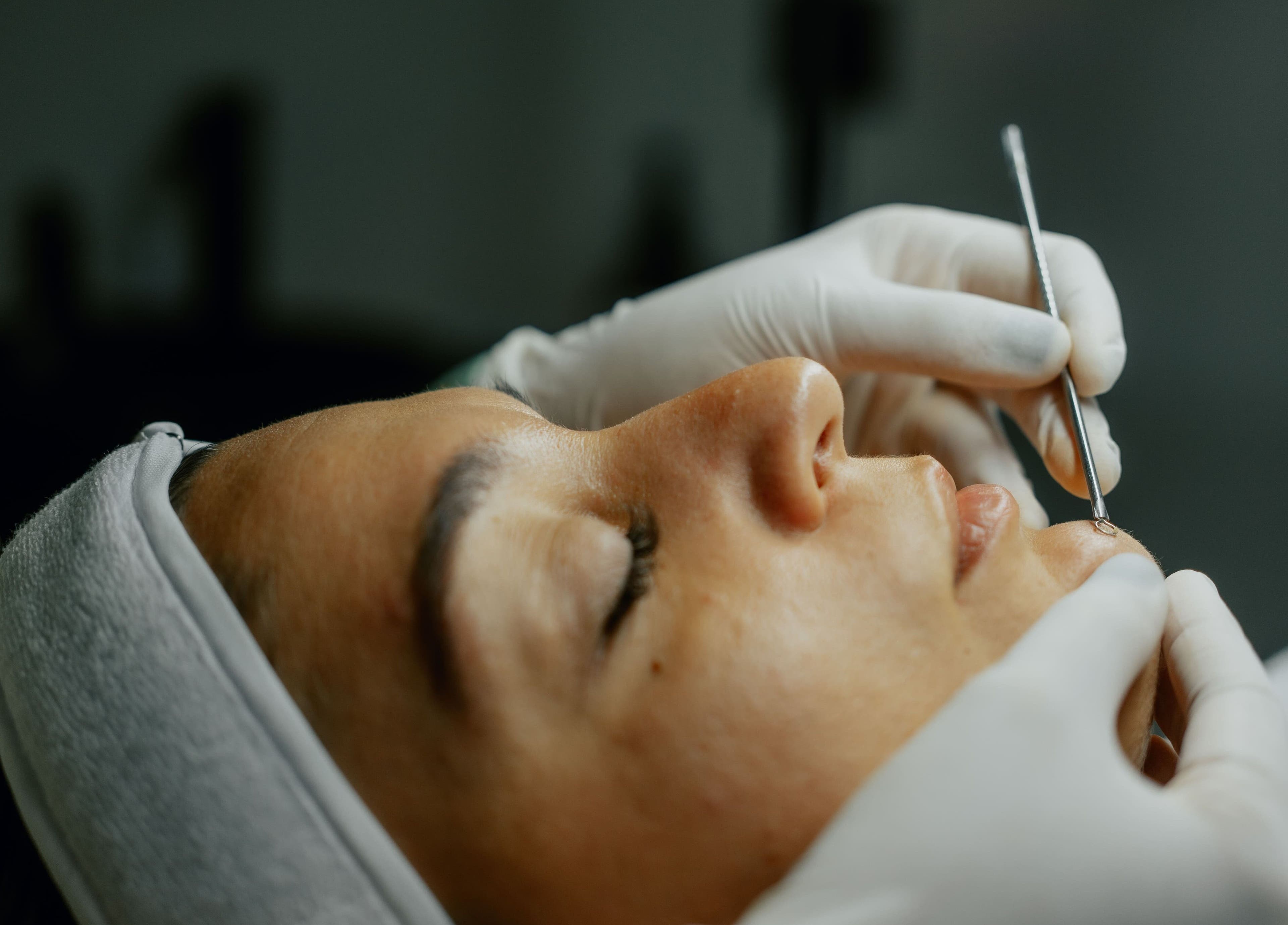 Facial treatment at Beam & Bare, Bali, Bali, ID, showcasing skilled beauty care in a relaxing environment.