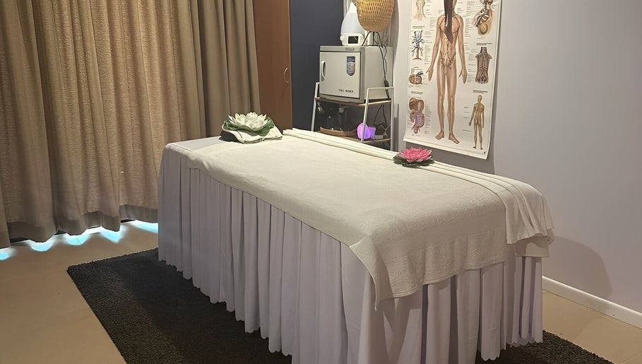 Massage room at Tran Spa and Massage, Stretton, Queensland, AU with a white massage table.