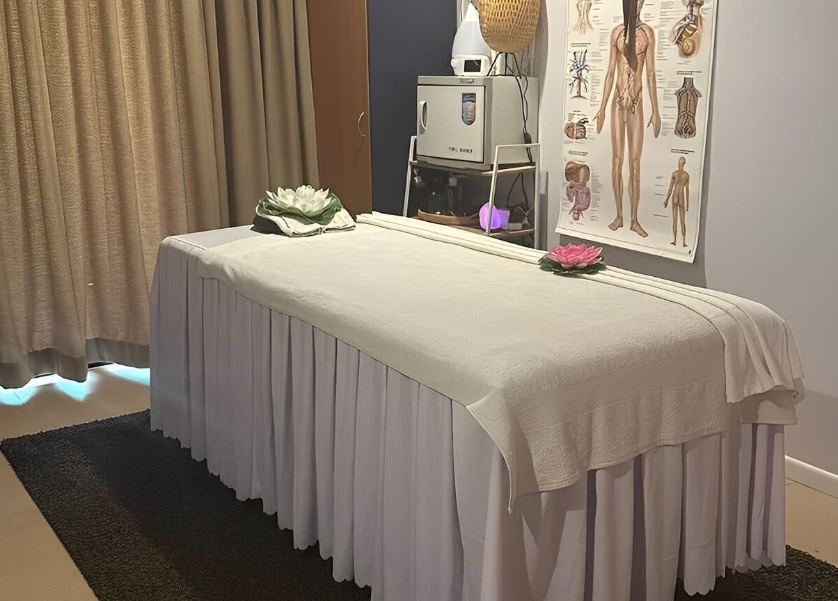 Massage room at Tran Spa and Massage, Stretton, Queensland, AU with a white massage table.