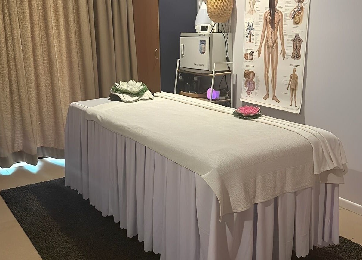 Massage room at Tran Spa and Massage, Stretton, Queensland, AU with a white massage table.