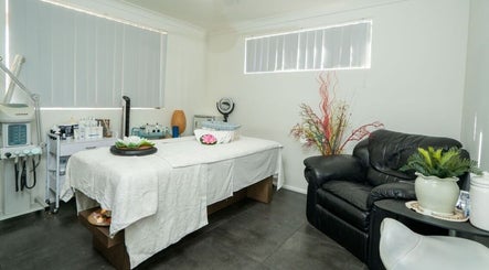 Tranquil massage room at Tran Spa and Massage, Stretton, Queensland, AU with a cozy bed and soothing decor.