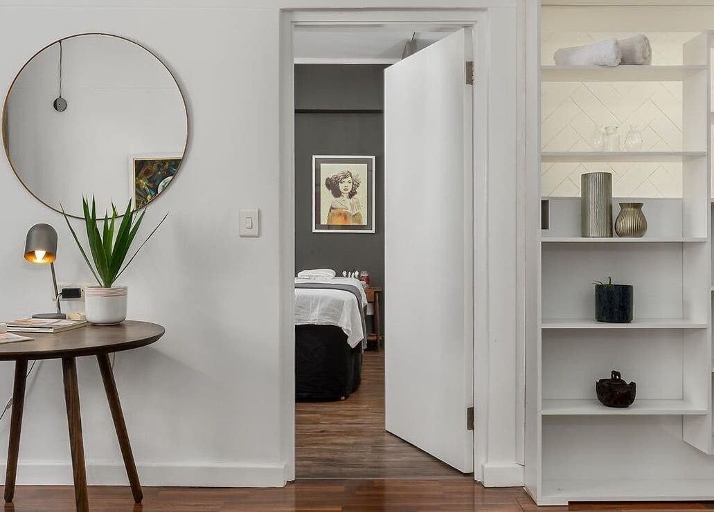 Elegant massage room at More Massage in Cape Town, Western Cape, ZA with stylish decor and calming ambiance.