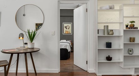 Elegant massage room at More Massage in Cape Town, Western Cape, ZA with stylish decor and calming ambiance.