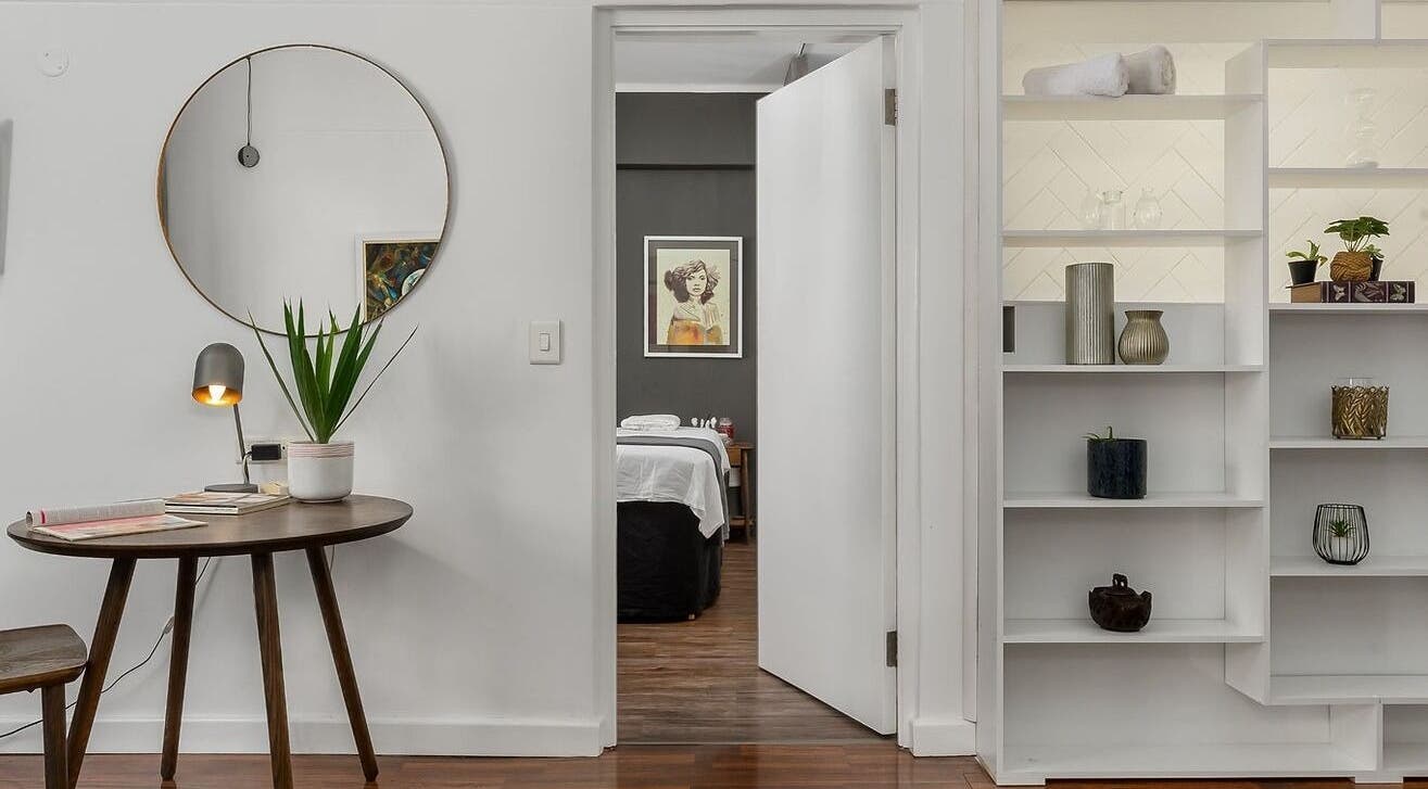 Elegant massage room at More Massage in Cape Town, Western Cape, ZA with stylish decor and calming ambiance.