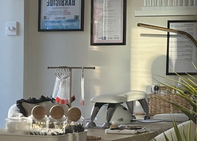 Elegant nail care setup at Nails by Ezme, Ashford, England, GB, showcasing tools and decor.