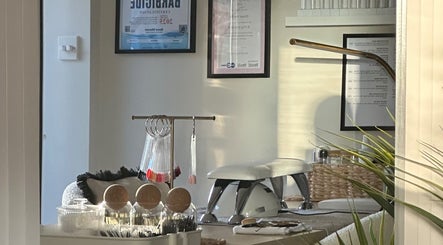 Elegant nail care setup at Nails by Ezme, Ashford, England, GB, showcasing tools and decor.