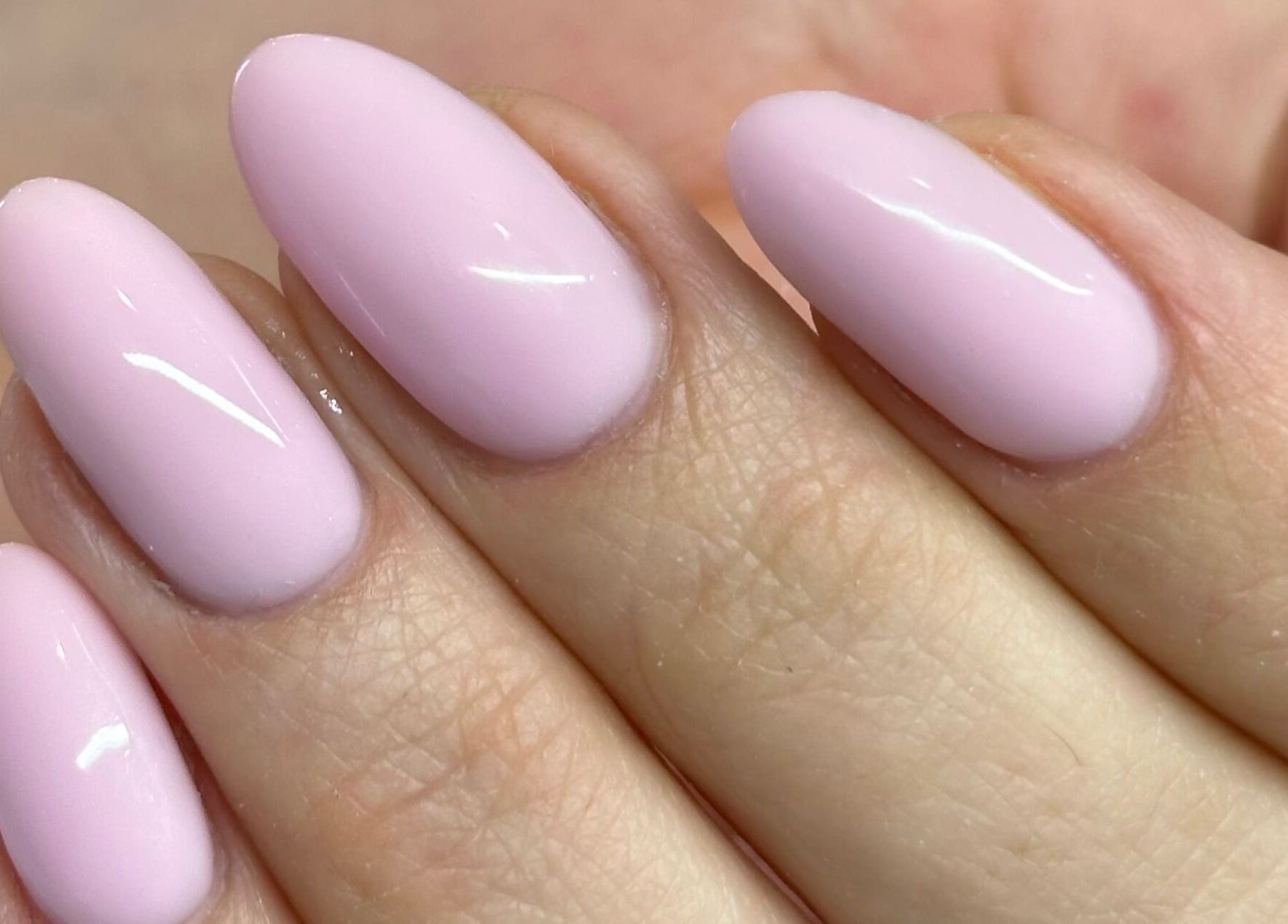Elegant blush pink nails at Nails by Ezme in Ashford, England, GB showcase flawless manicure.
