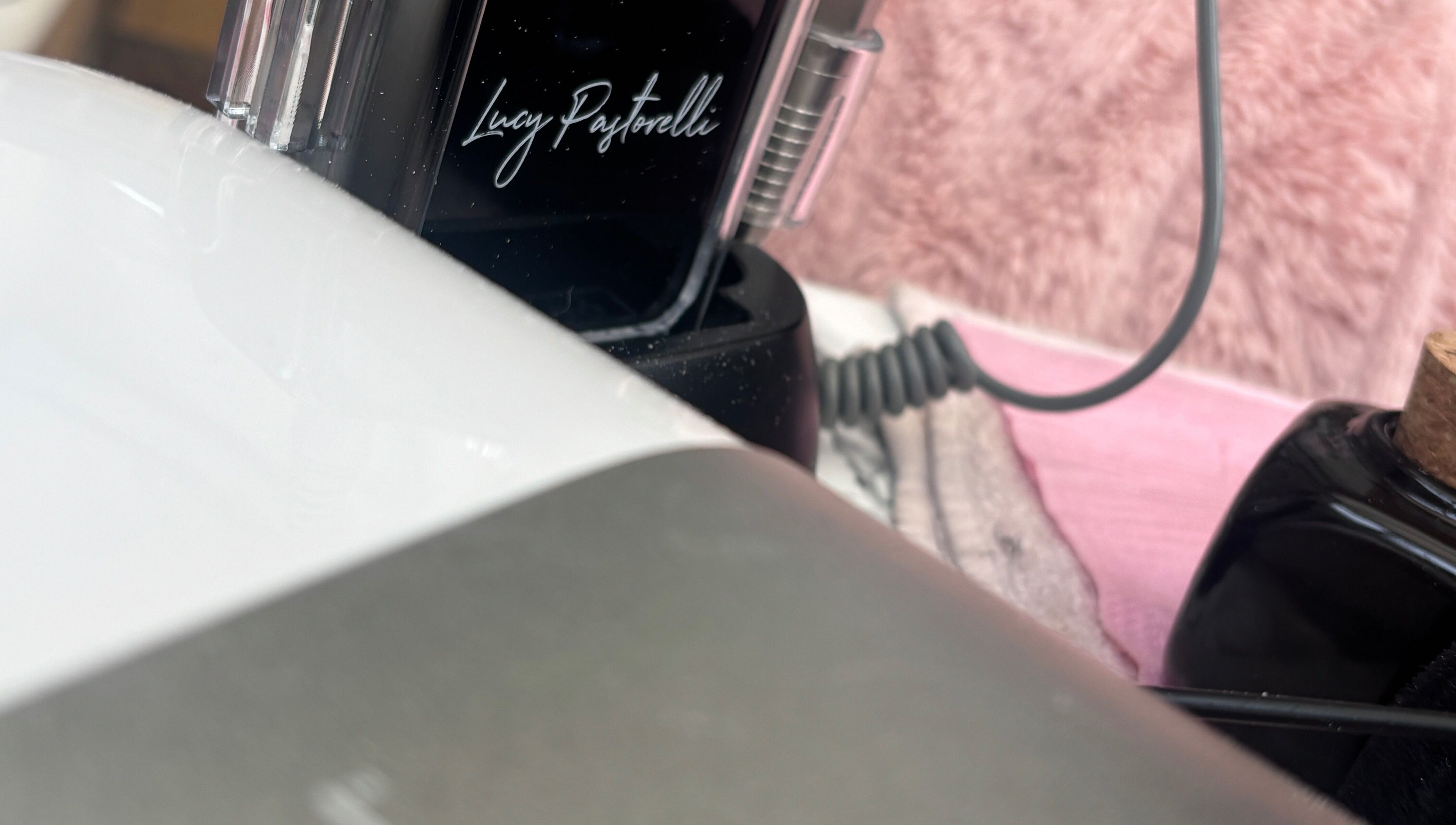 Lucy Pastorelli tools at The.GloLounge in Wittering, England, GB, highlighting modern salon equipment.