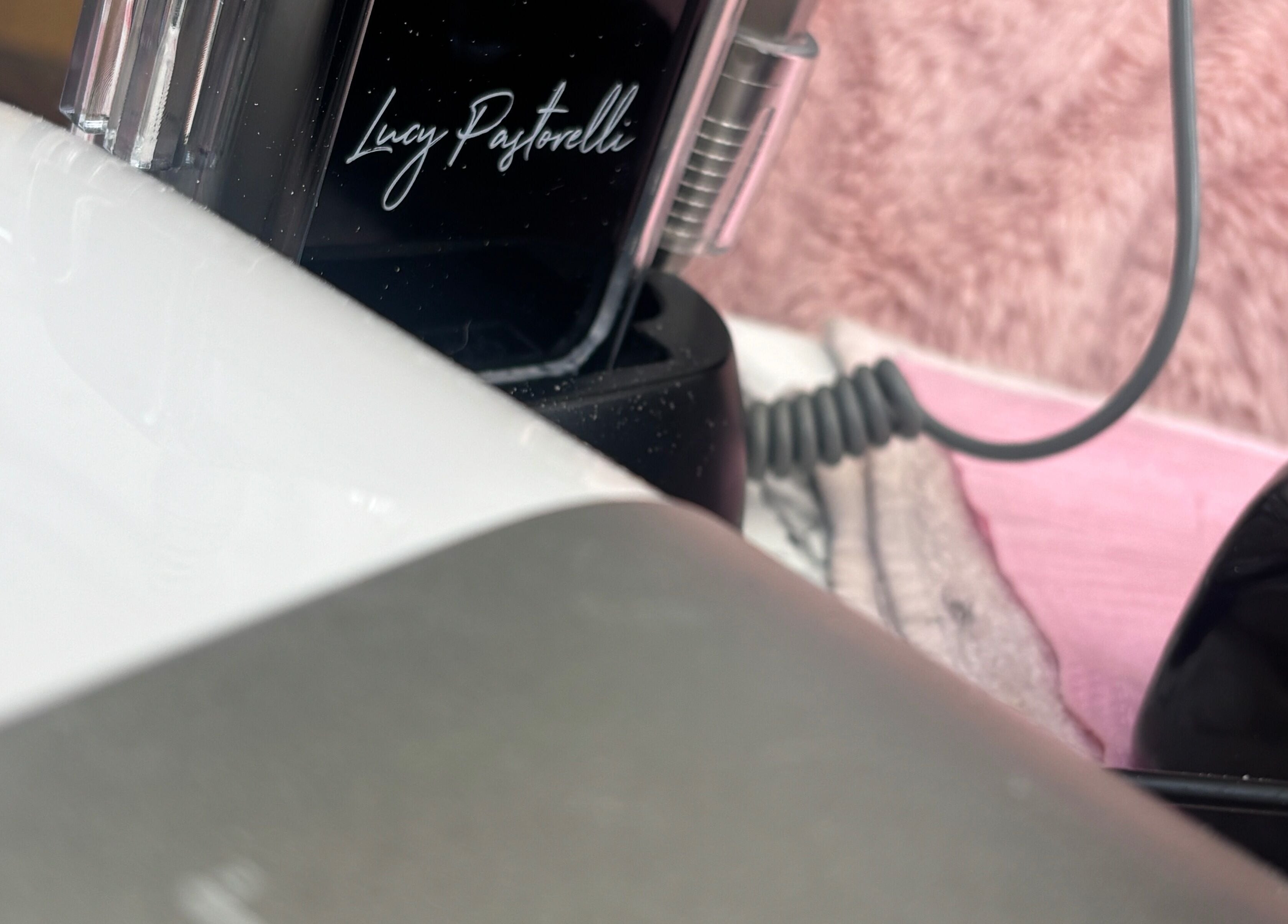 Lucy Pastorelli tools at The.GloLounge in Wittering, England, GB, highlighting modern salon equipment.