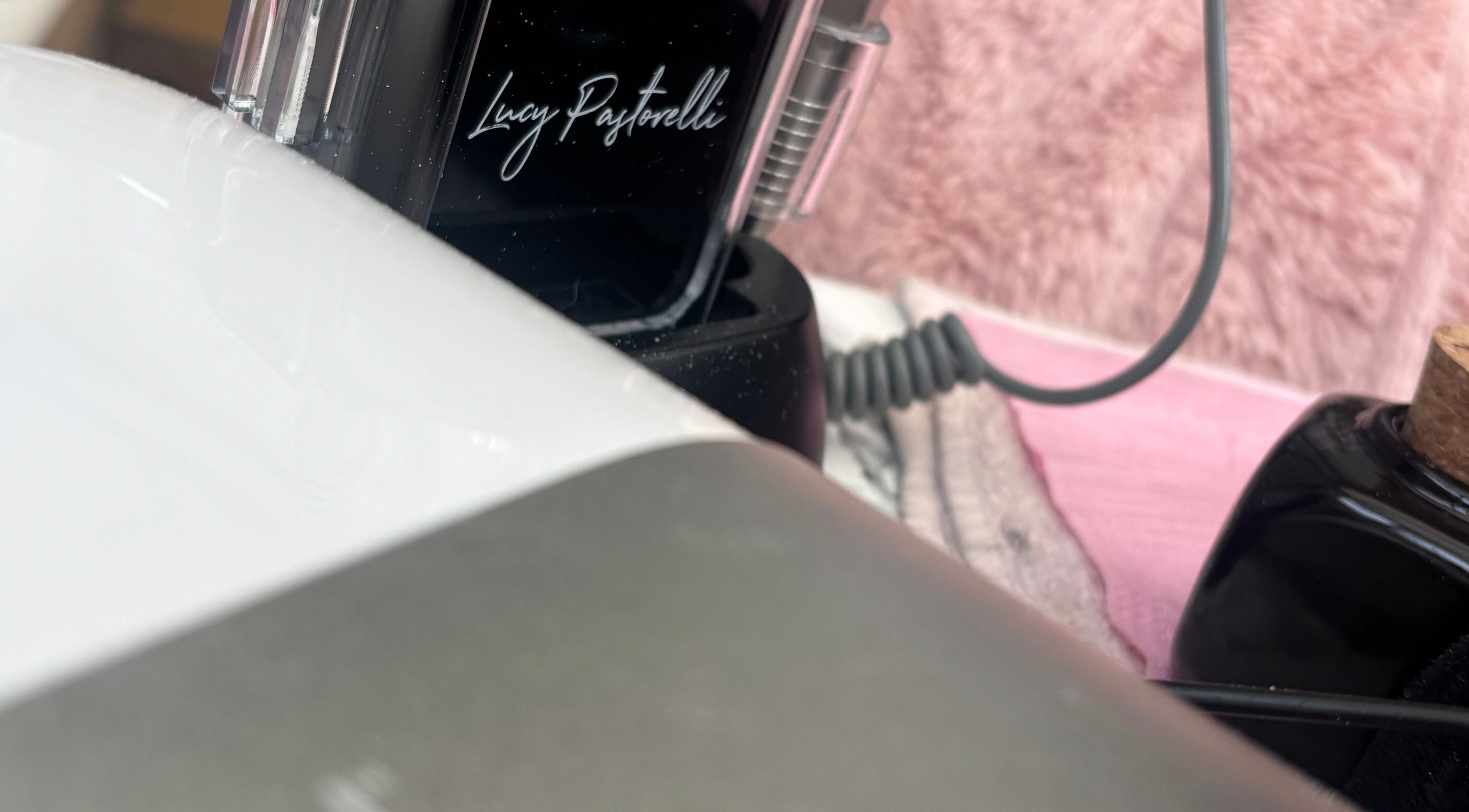 Lucy Pastorelli tools at The.GloLounge in Wittering, England, GB, highlighting modern salon equipment.