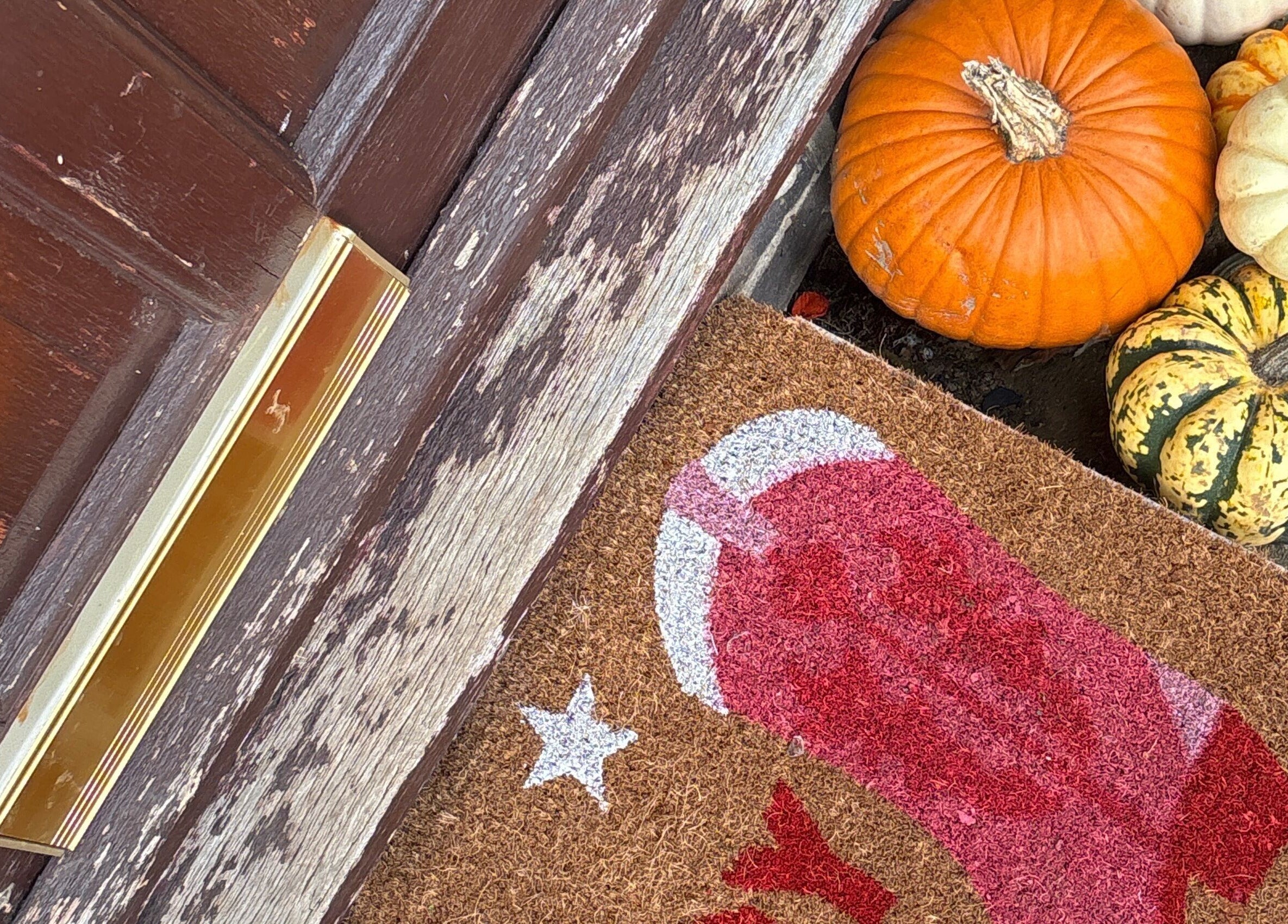Festive pumpkins adorn The.GloLounge's entrance in Wittering, England, GB for a warm autumn welcome.