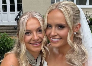 Smiling women at Get Sprayed, Exeter, England, GB, showcasing bridal beauty in an outdoor setting.