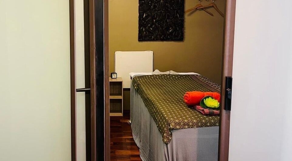 Tranquil massage room at Sby Spa Wellnesscenter in Sandton, Gauteng, ZA with a neatly prepared bed and decor.