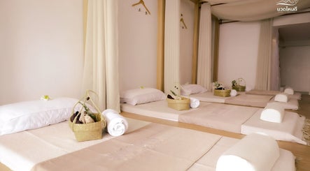 Relaxing massage area at My Day Thai Massage in Krung Thep Maha Nakhon offering tranquil ambiance.
