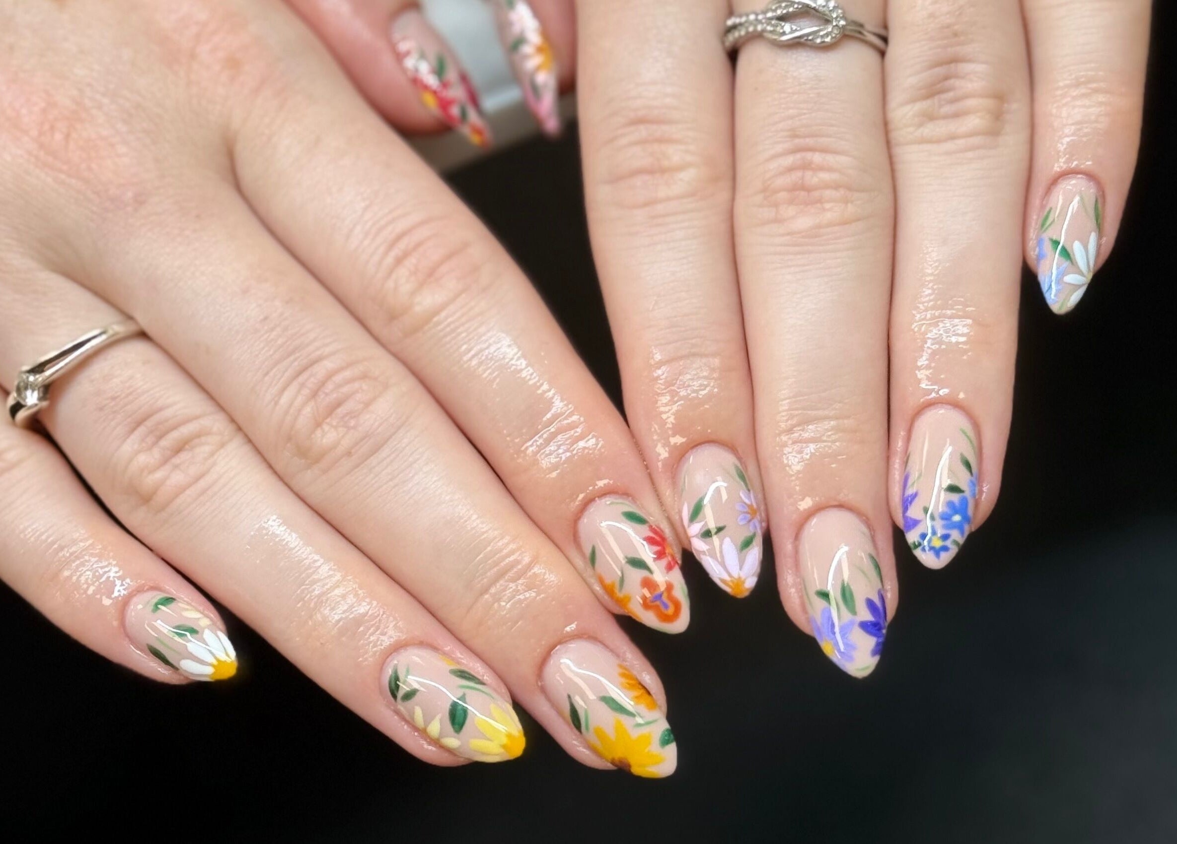 Elegant floral nail art at The Studio Nail Box, Cardiff, Wales, GB. Perfect for beauty and wellness enthusiasts.