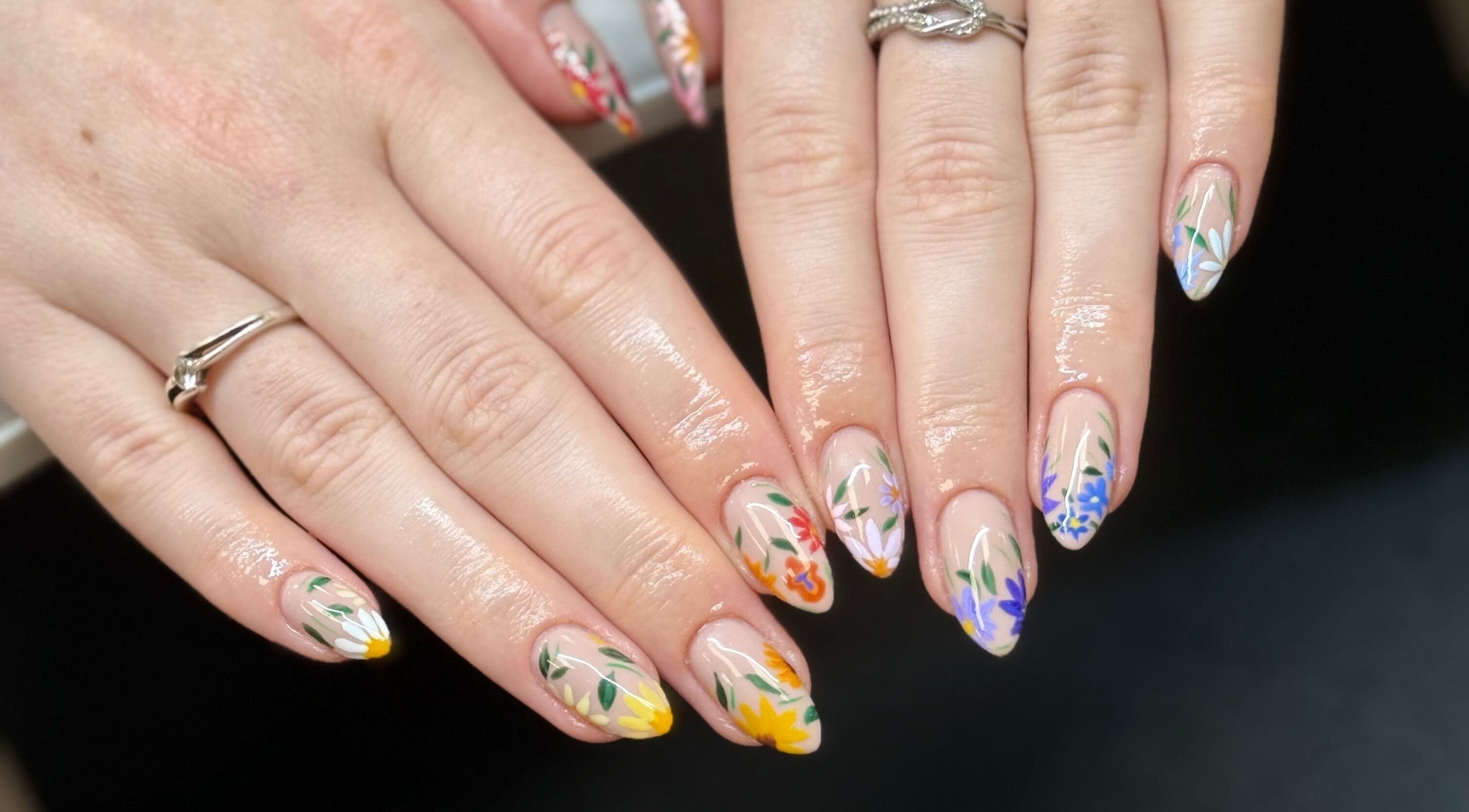 Elegant floral nail art at The Studio Nail Box, Cardiff, Wales, GB. Perfect for beauty and wellness enthusiasts.
