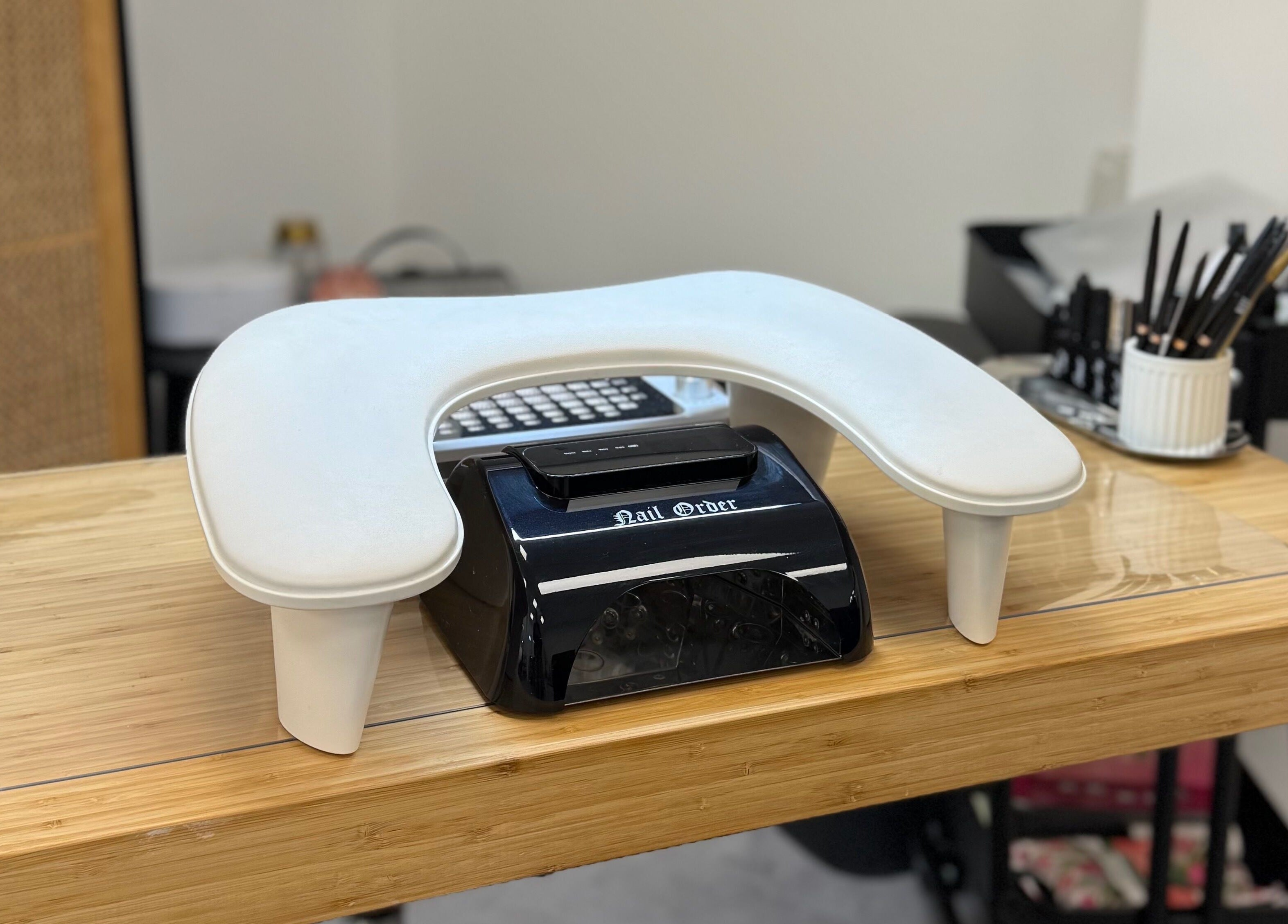 Manicure station at The Studio Nail Box, Cardiff, Wales, GB, featuring professional nail tools.