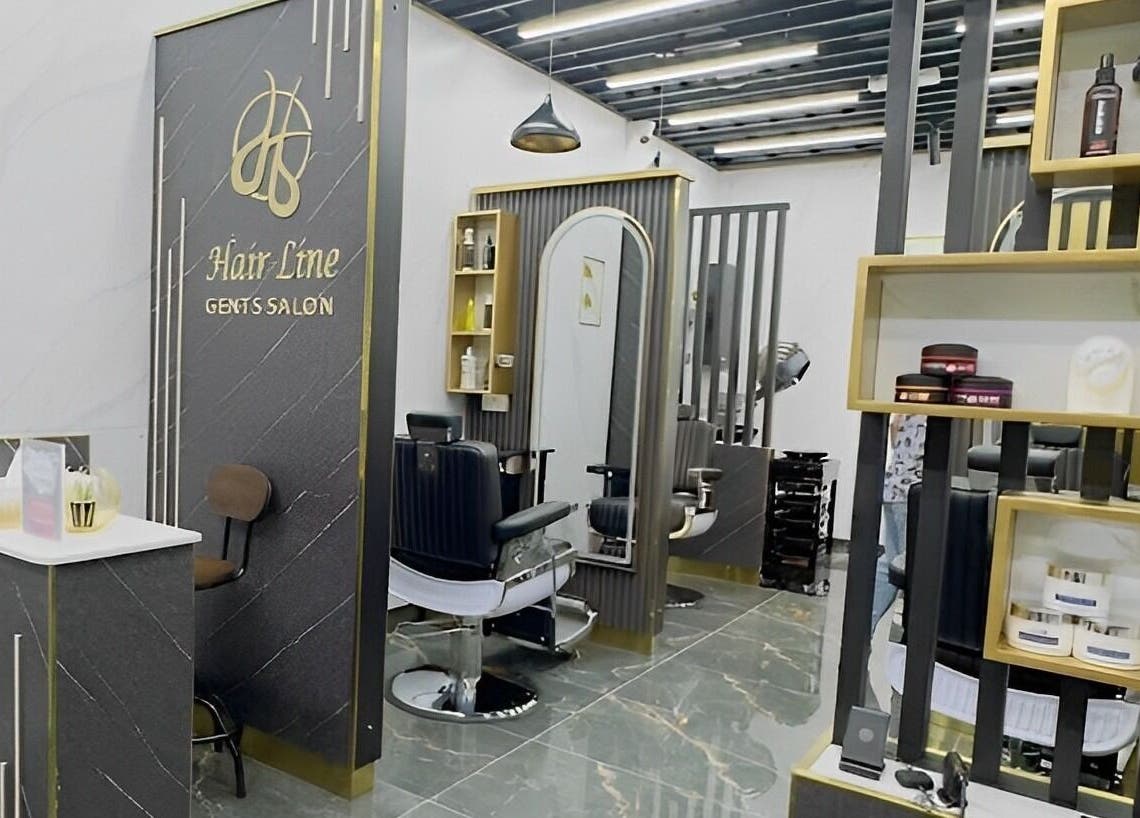 Elegant interior of Hair Line Gents Salon, Sharjah, Sharjah, AE with modern chairs and décor.