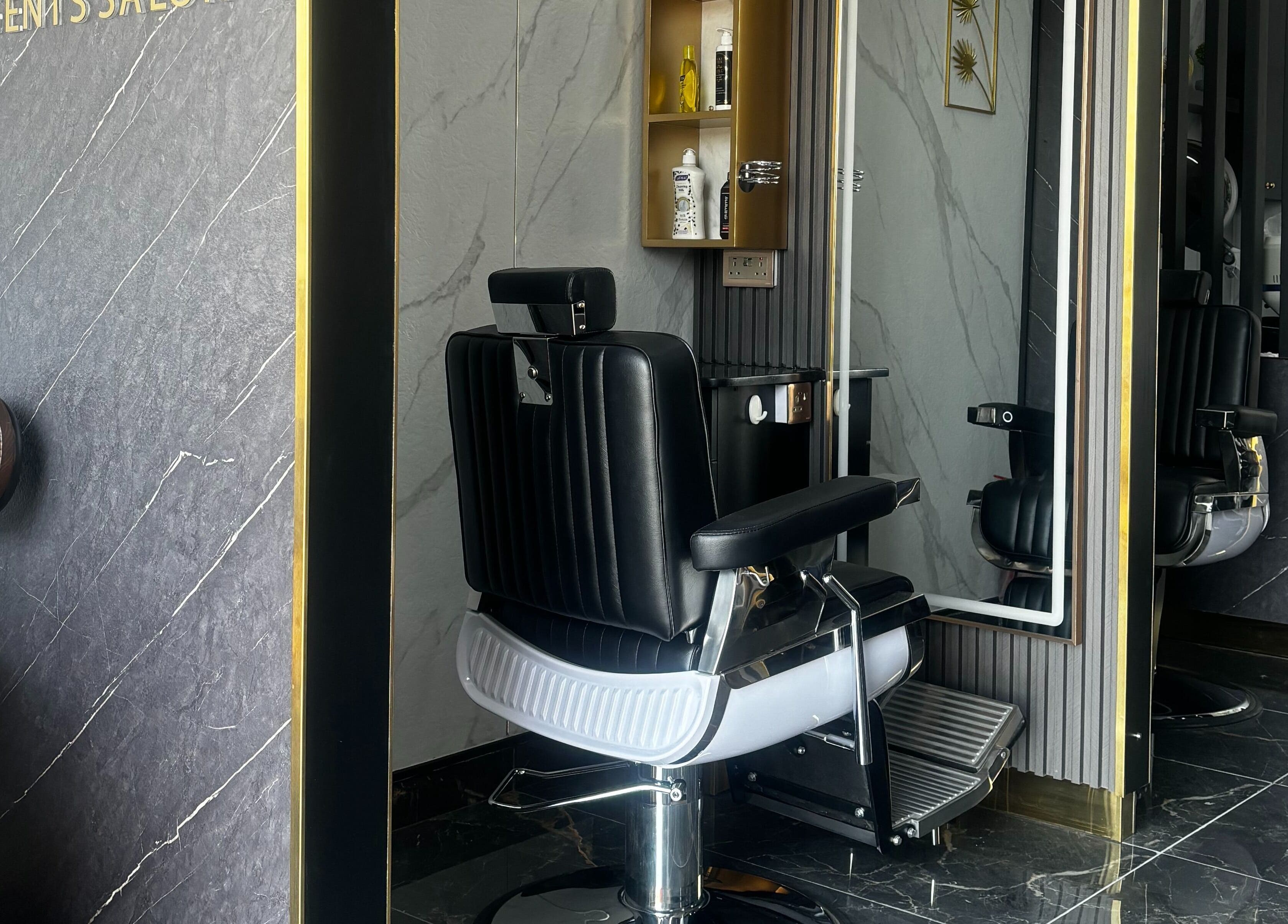 Luxurious barber chair at Hair line gents salon, Sharjah, Sharjah, AE, showcasing sleek modern design.