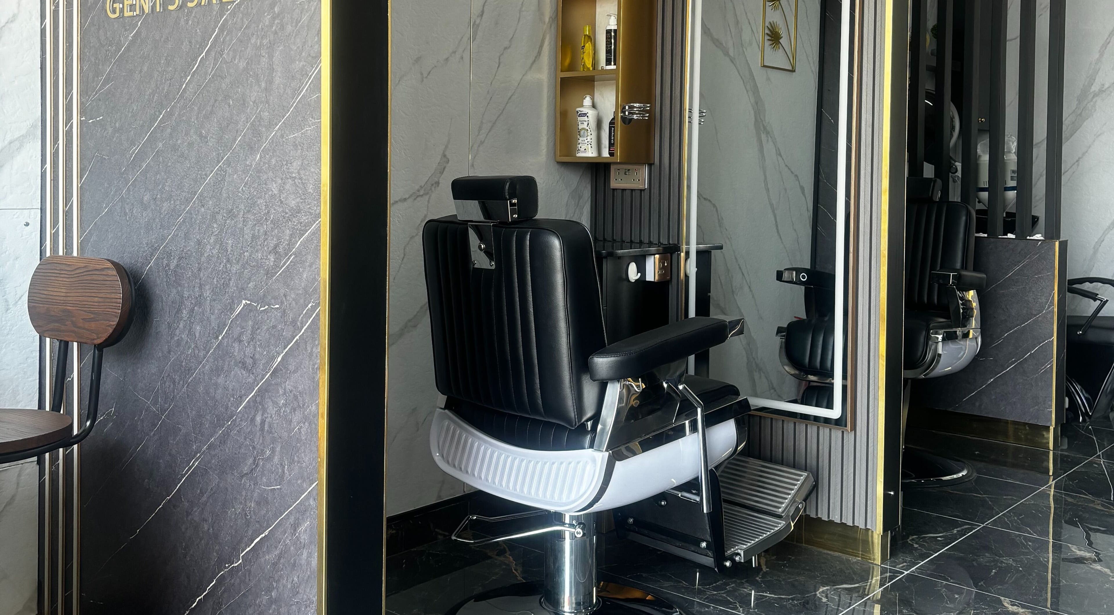 Luxurious barber chair at Hair line gents salon, Sharjah, Sharjah, AE, showcasing sleek modern design.