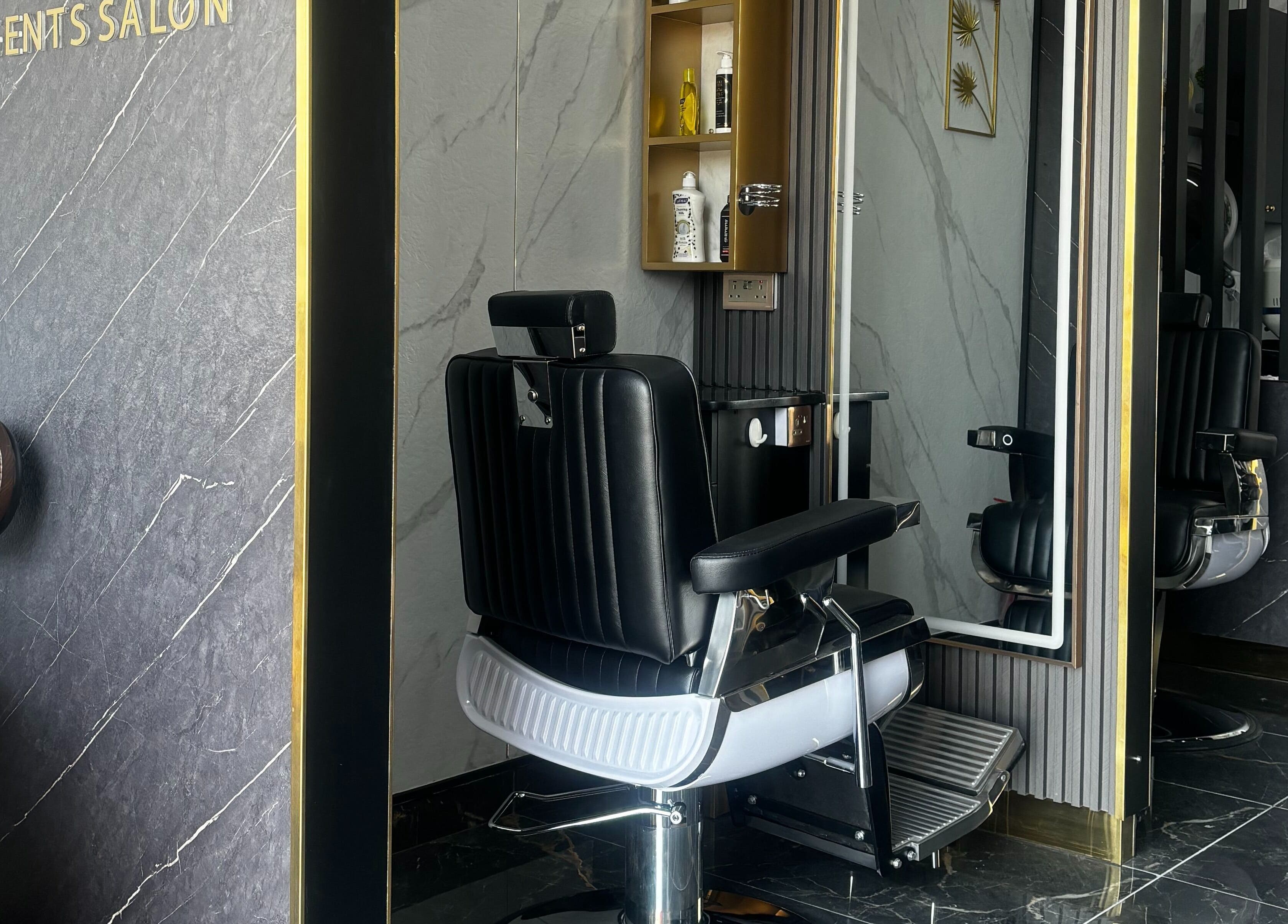 Modern barber chair at Hair Line Gents Salon - Al Jada, Sharjah, Sharjah, AE with stylish decor.