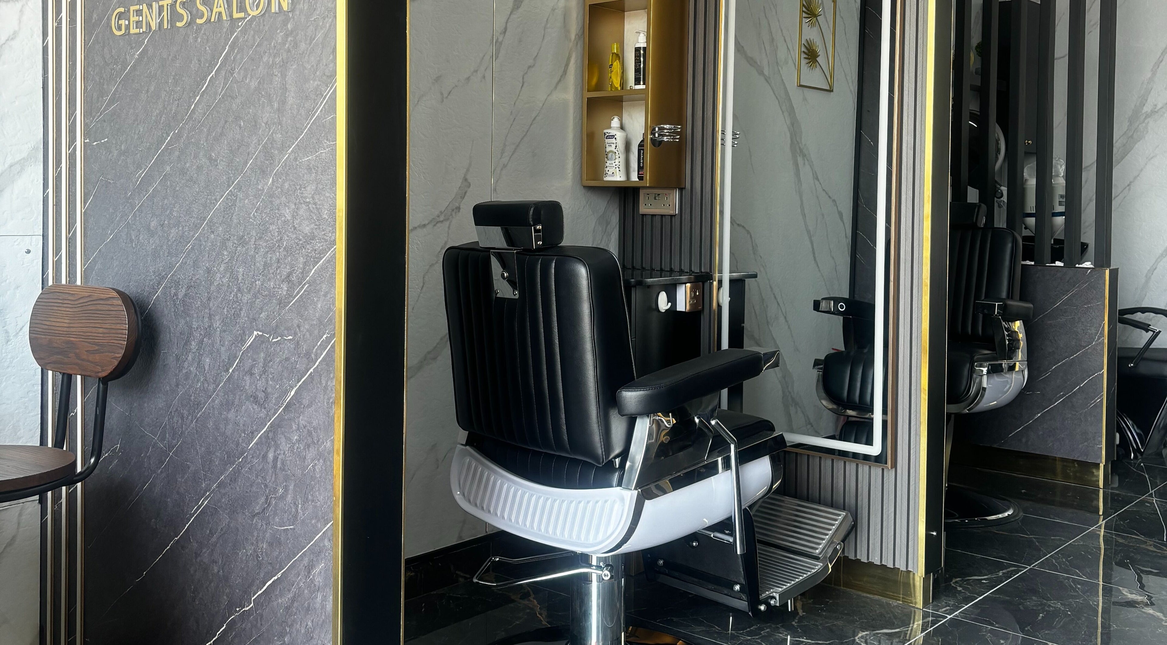 Modern barber chair at Hair Line Gents Salon - Al Jada, Sharjah, Sharjah, AE with stylish decor.