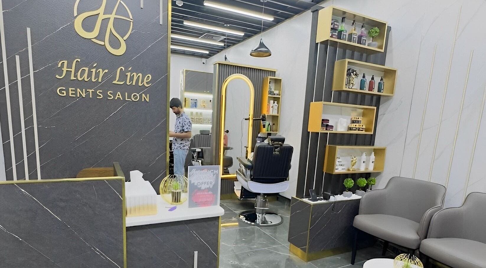 Interior of Hair Line Gents Salon - Al Jada, Sharjah, AE, featuring stylish decor and a barber chair.