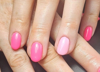 Pink manicure at O'Nails, Newry, Northern Ireland, GB, displaying glossy polished nails.