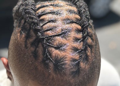 Intricate braid style at Getrightwjessy in Decatur, Georgia, US showcasing expert hair design.