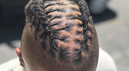 Intricate braid style at Getrightwjessy in Decatur, Georgia, US showcasing expert hair design.
